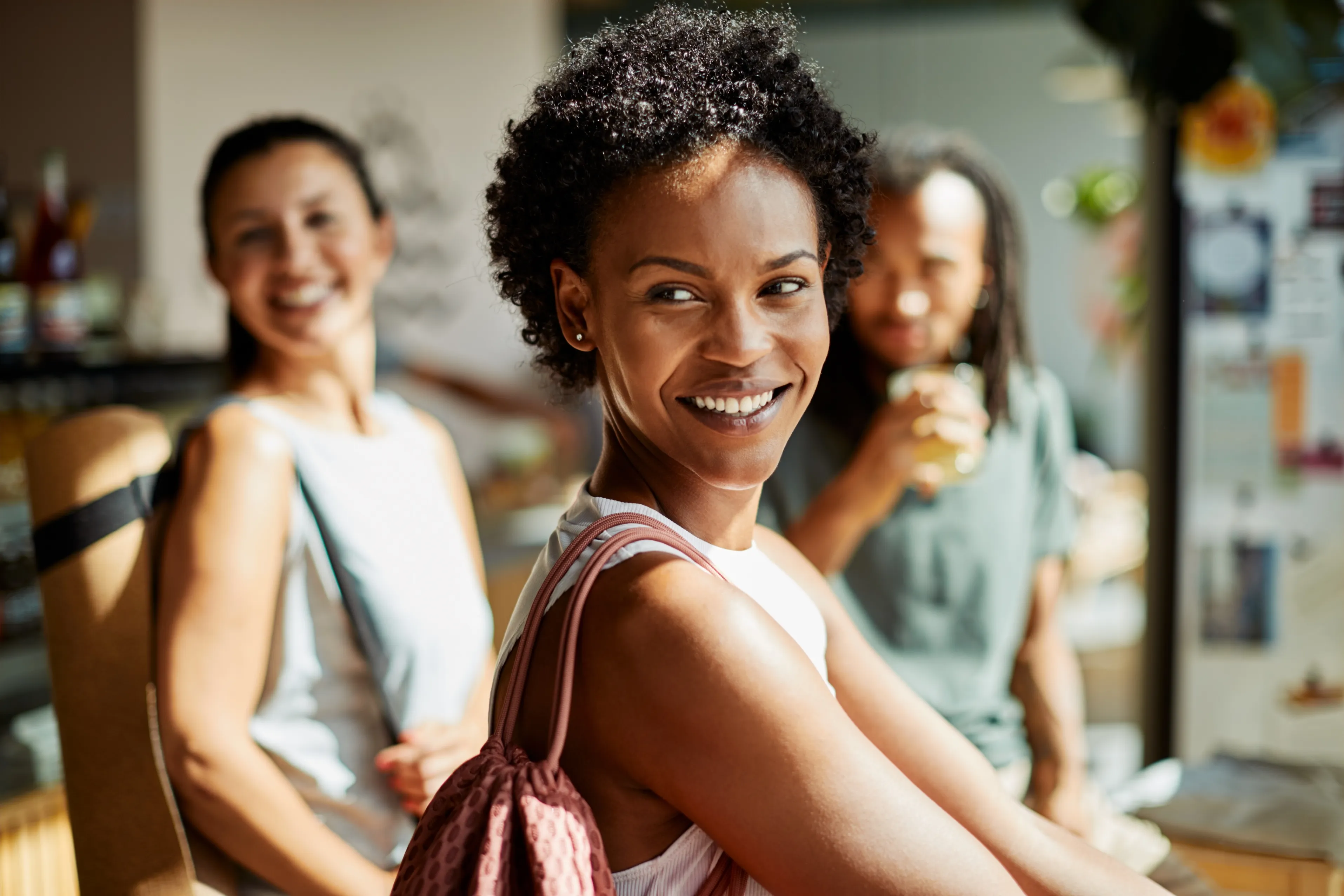 Smiling young women together.