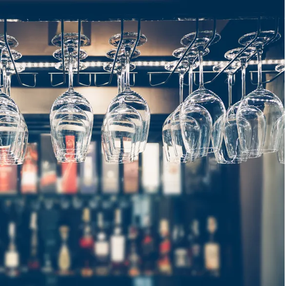empty-glasses-wine-above-bar-rack